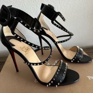 Christian Louboutin black with spikes. Worn once for a wedding